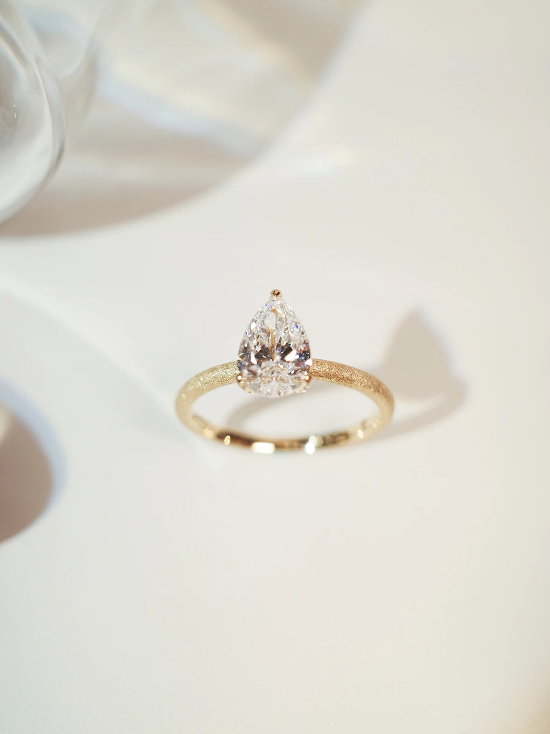 Golden Radiance Solitaire Pear-cut Diamond Ring