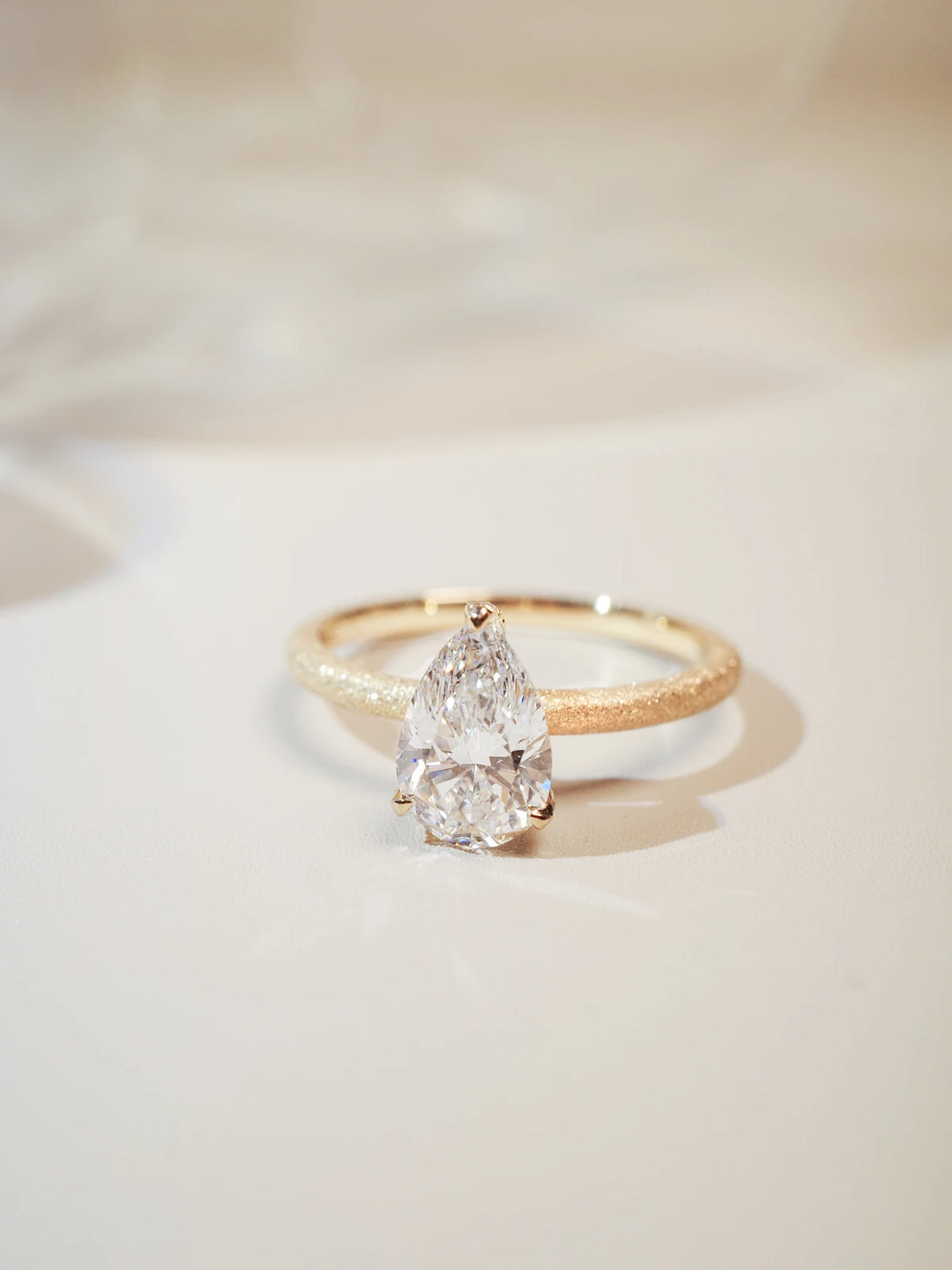 Golden Radiance Solitaire Pear-cut Diamond Ring
