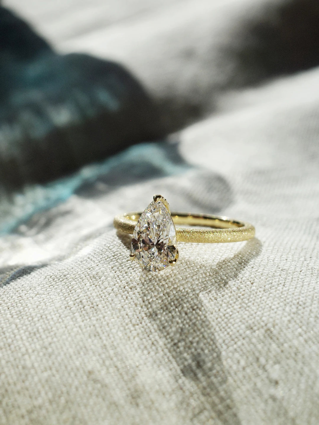 Golden Radiance Solitaire Pear-cut Diamond Ring